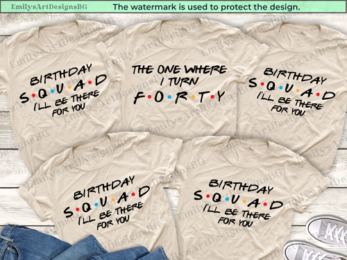 Beige t-shirts with birthday-themed text on a wooden surface.