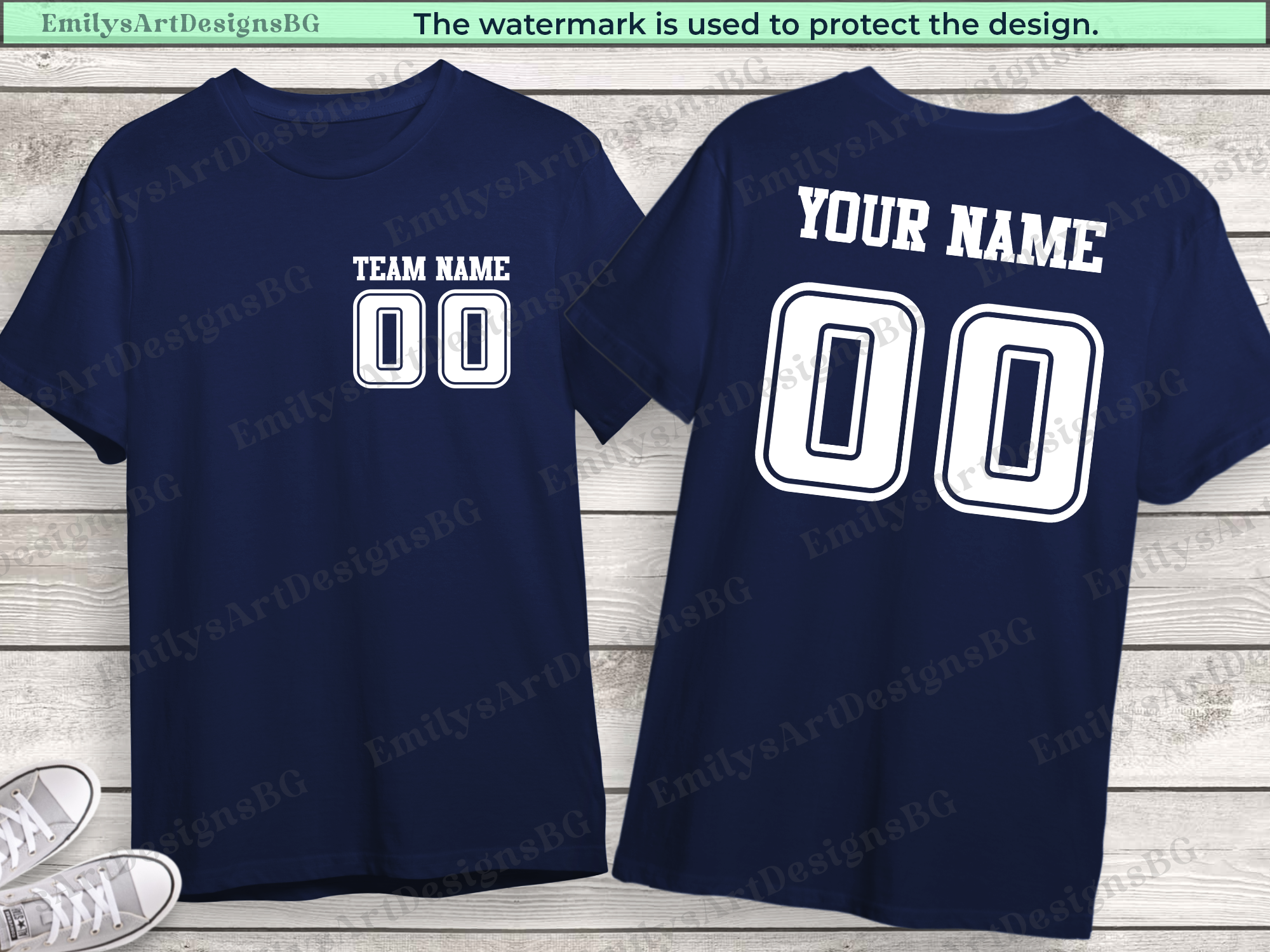 Two navy blue t-shirts with customizable text on a wooden surface