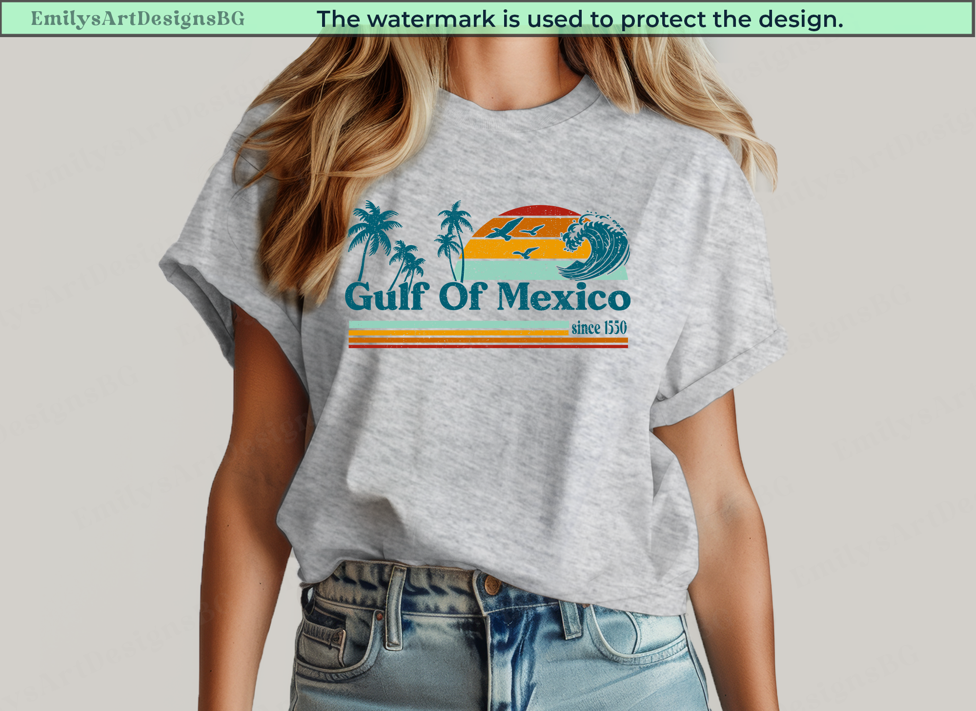 Gray t-shirt with 'Gulf of Mexico' design worn by a person on a plain background