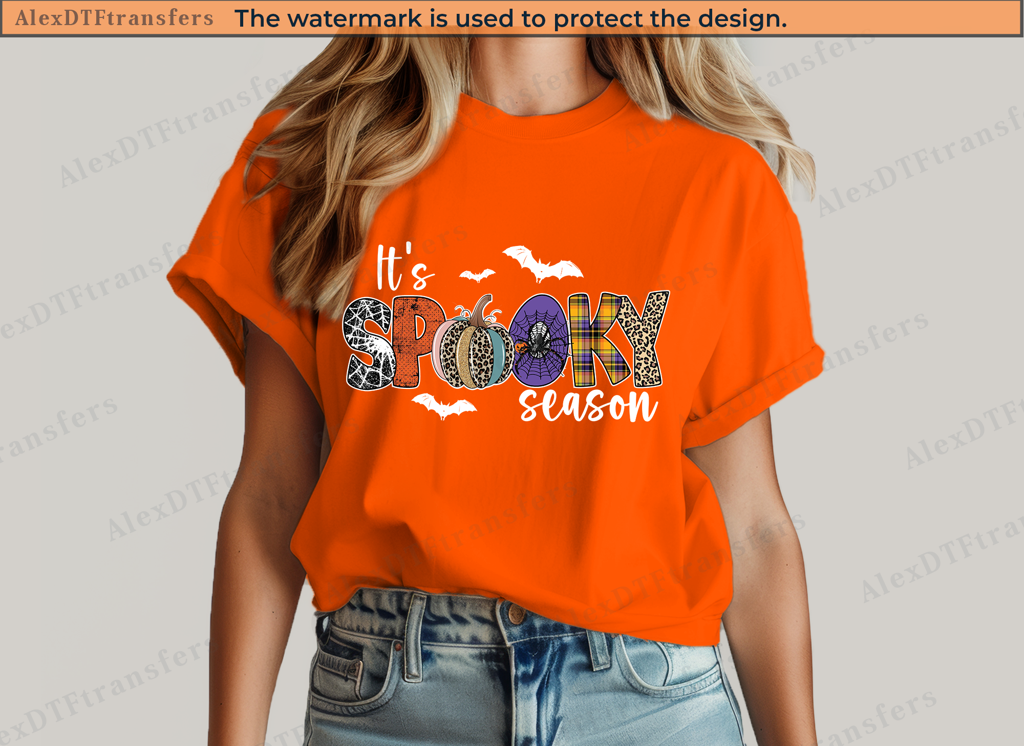 Orange t-shirt with 'It's Spooky Season' text and Halloween graphics on a plain background